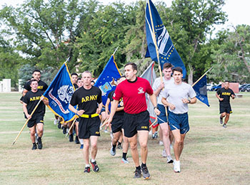 group of army members running