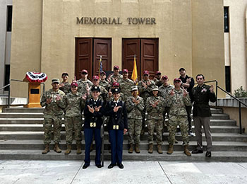NMSU ROTC members standing in front of the Memorial Tower